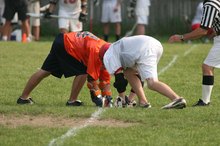 Difference Between a Football Cleat & a Lacrosse Cleat