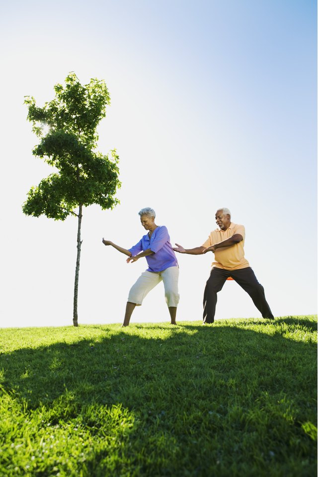 Senior couple doing Tai Chi