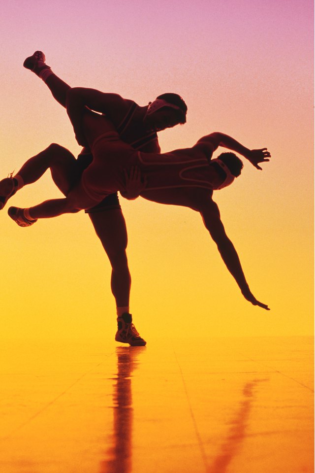 Silhouette of wrestlers