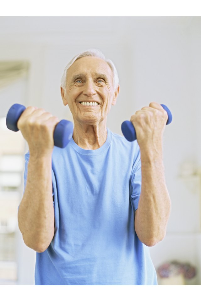senior man exercising with dumbbells