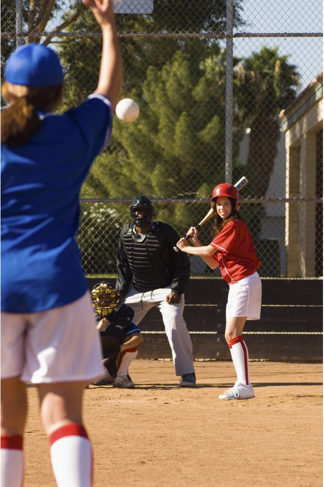 Pitcher Throwing Softball Towards Batter