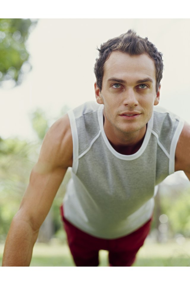 young man exercising in a park