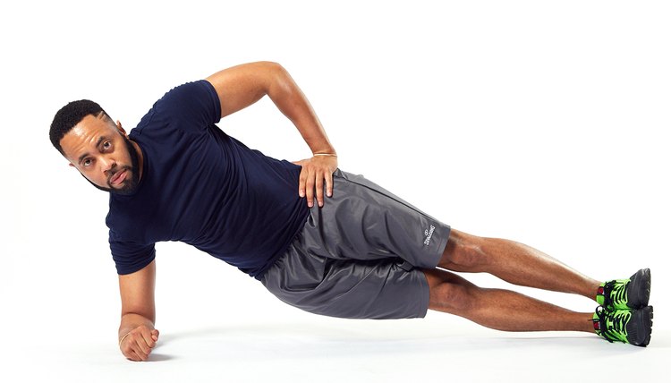 man doing a side plank
