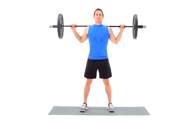 young girl doing squats with barbell