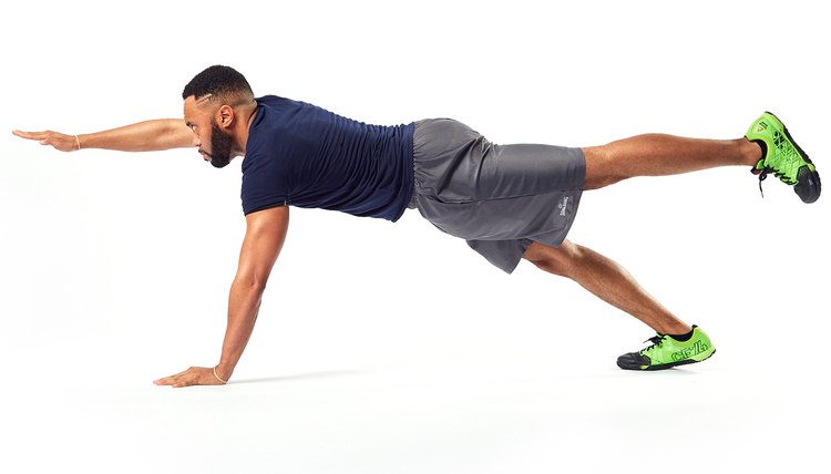 man doing a two-limbed plank