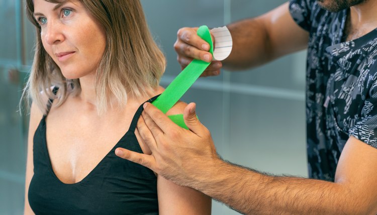 Shoulder treatment with kinesio tape