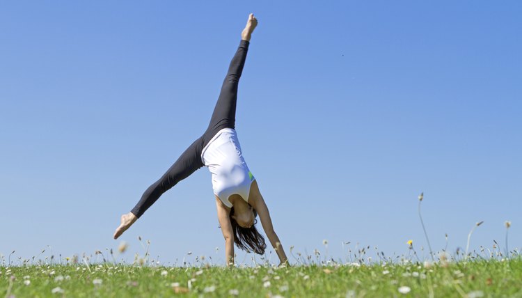 Cartwheeling Young Woman