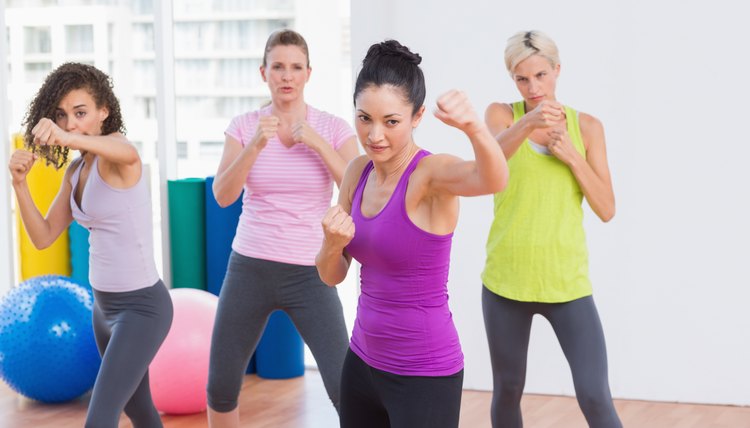 Women boxing at fitness studio