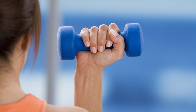 Woman holding free weight