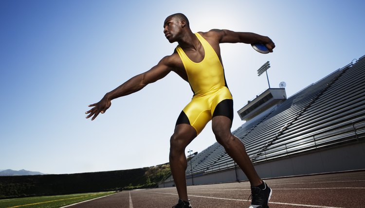 Athletic man preparing to throw discus
