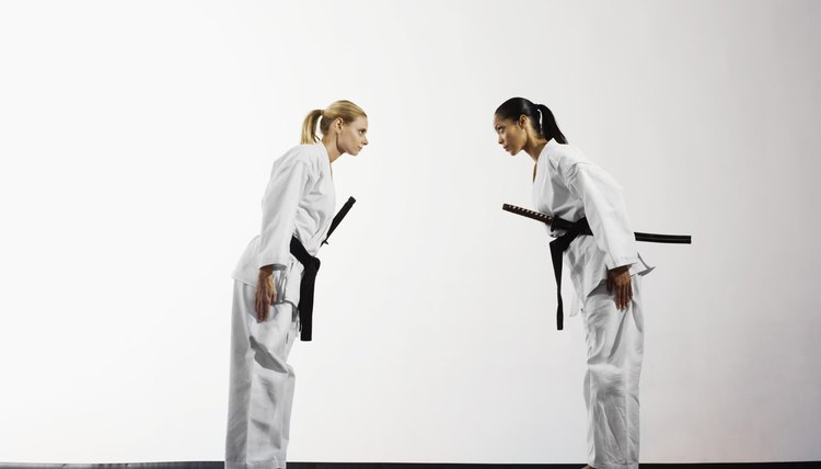Women bowing to each other
