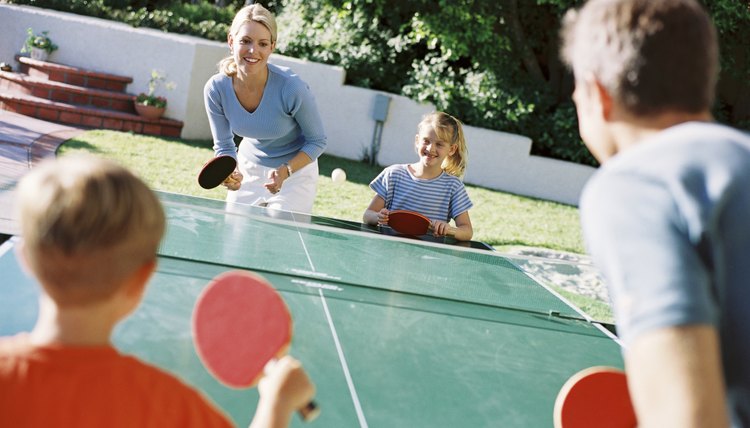 Family playing ping pong