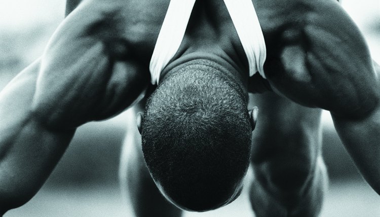 Runner bending forward, stretching