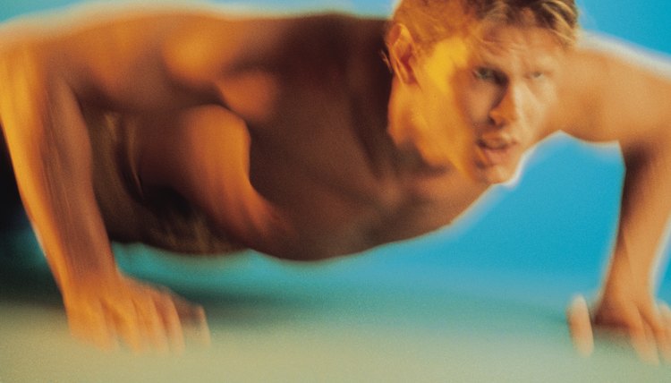 Athletic man doing push-ups