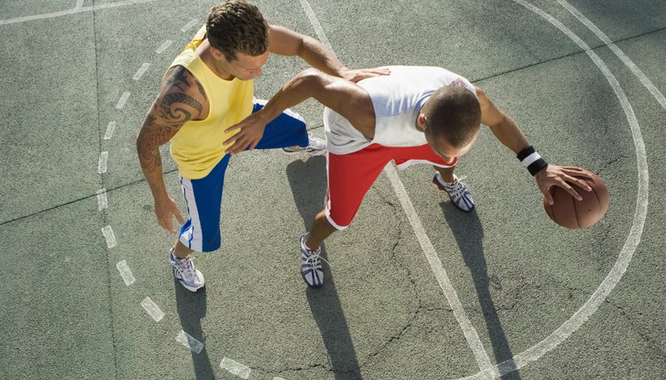 Men playing basketball