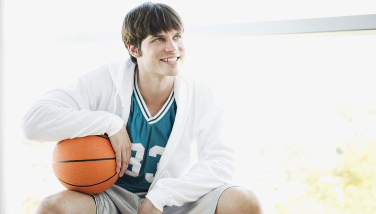Seated basketball player looking away