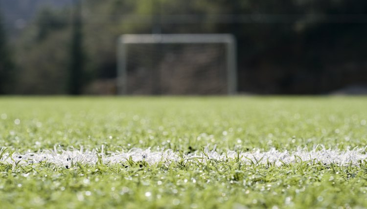 Football goal post on empty pitch, Turkey, Istanbul