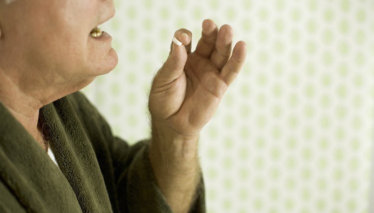Man Taking Pill