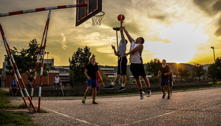 Street basketball at sunset
