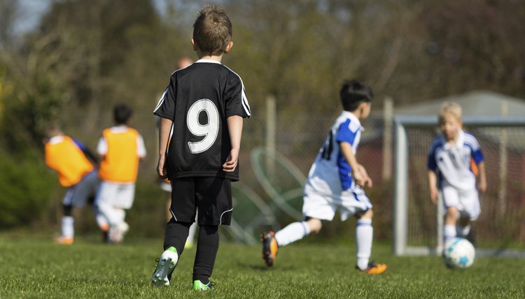 Kids practicing soccer
