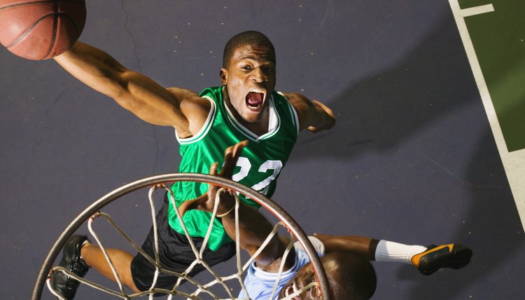 Basketball players playing basketball