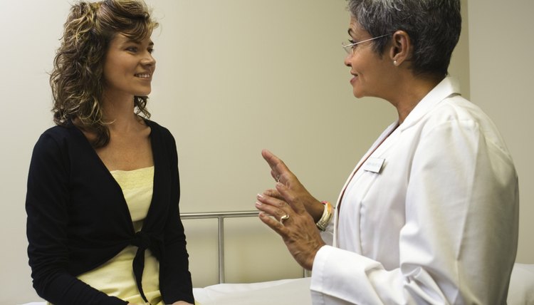 Doctor talking with patient