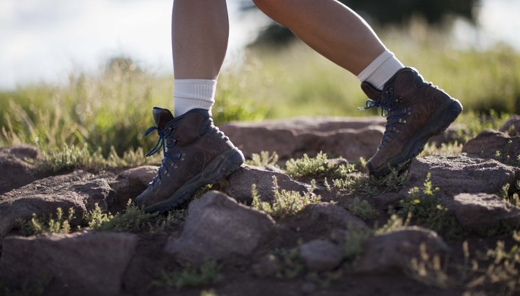 Person hiking on rocks