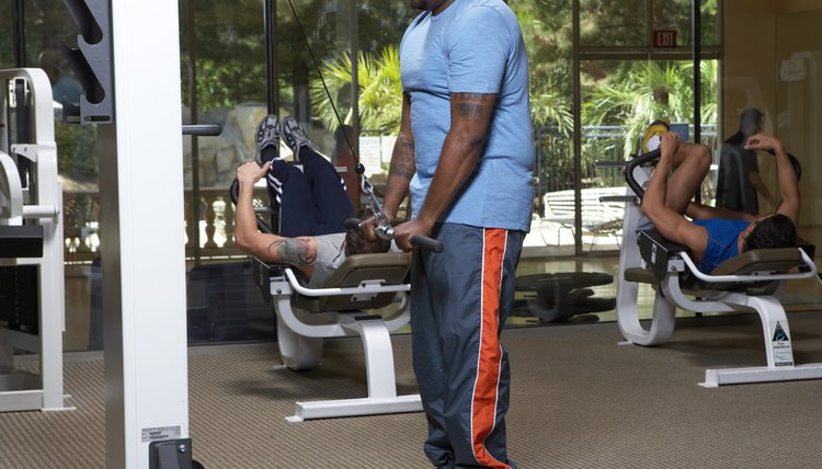 Men doing exercise in gym