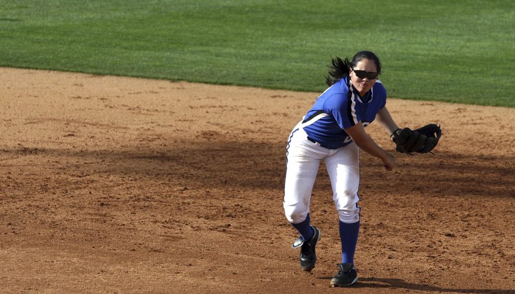 College Softball Player Throws Ball