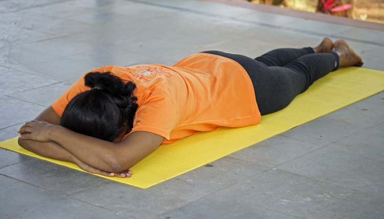 A woman doing yoga exercises