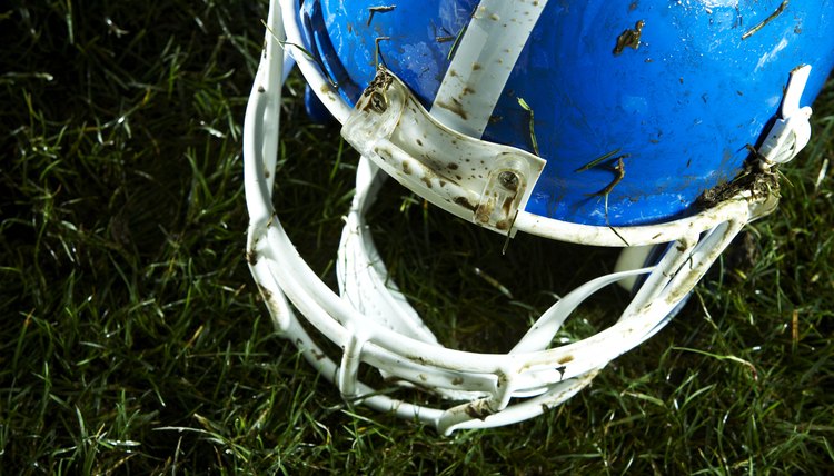 Football helmet on grass