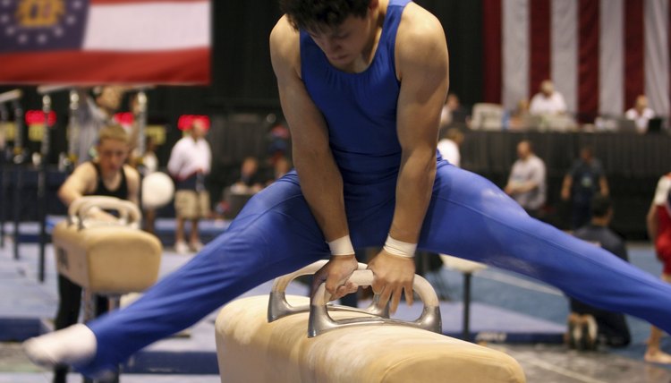 Boy competing on pommel