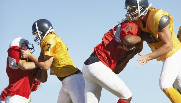 Football Players Tackling