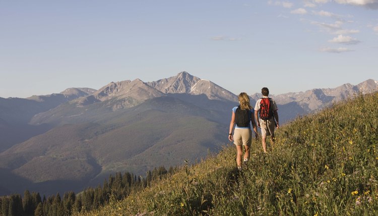 People hiking on mountainside