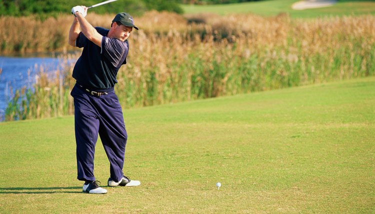 Man playing golf