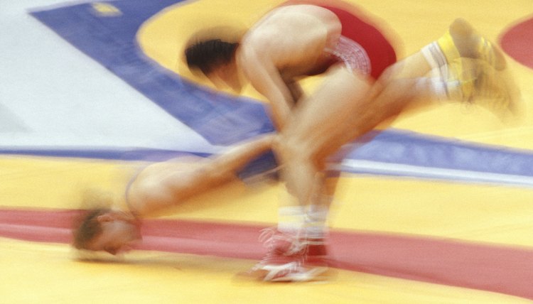 Two men wrestling, side view, Seoul Olympics, (blurred motion)
