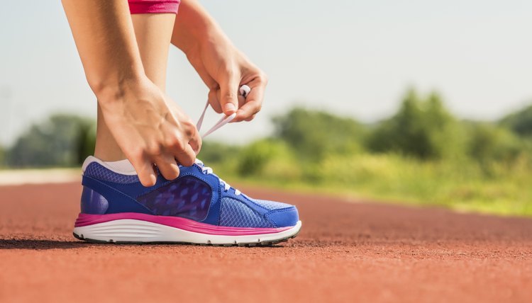 Tying sports shoe