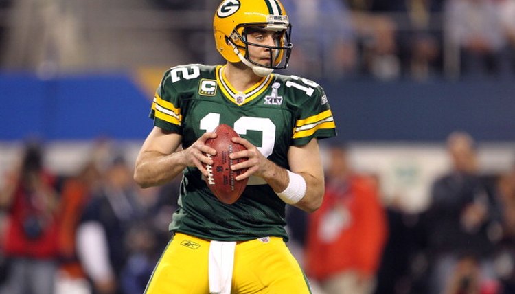 A quarterback in the pocket preparing to throw.