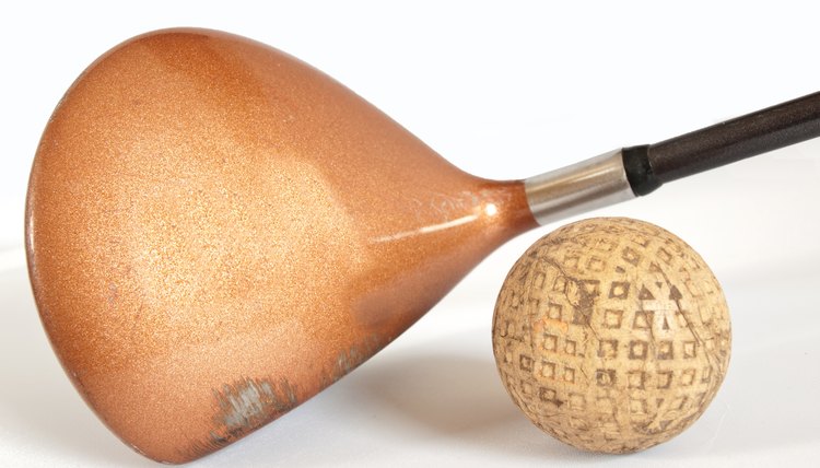 old golf club and ball